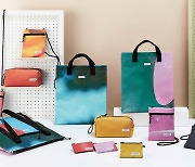 현대백화점, 현수막 재활용한 '업사이클 패션 가방' 선봬