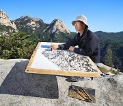 Meet the artist taking his paintings to new heights