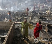 APTOPIX Pakistan Fire