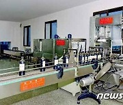 평안북도에 새로 지어진 기초식품공장의 생산공정