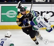 APTOPIX Canucks Bruins Hockey