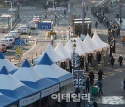 [포토]'7천명 돌파' 코로나19 선별진료소 '북적'