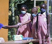 Virus Outbreak Uganda Schools Reopen