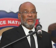 아이티 총리 가리키는 대통령 암살 증거들