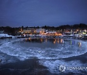 APTOPIX Ice Disk Maine