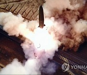 화염 내뿜으며 열차에서 발사된 '북한판 이스칸데르'