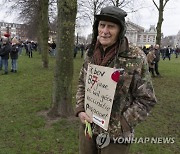 Virus Outbreak Netherlands Protests