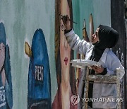 MIDEAST PALESTINIANS SHIREEN ABU AKLEH MURAL