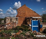 러 폭격에 무너져 내린 우크라 하르키우의 주택