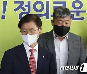 이정식·김동명 '노동 정책 대립각'
