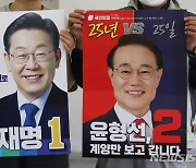 "가로수 의혹 허위" 이재명 측, 윤형선 후보 허위사실 공표 고발