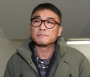 Prosecutors dismiss rape charge against singer Kim Gun-mo