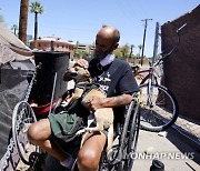 Climate-Extreme Heat and Homelessness