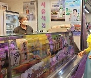 '우크라 국기' 연상 패션?..김건희 여사, 마드리드 시장 찾았다
