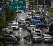 115년 만에 물난리에 홍수관련주 희비..재건·폐기물주↑ 손해보험주↓