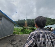 송전탑서 흘러내린 토사·나무 민가 덮쳐..주민 "안정성 문제 있다"