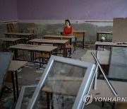 APTOPIX Russia Ukraine War Bombed Out School Photo Gallery