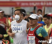 中, 3년 만에 베이징 마라톤 개최..방역 완화 기대감 '솔솔'