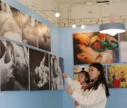 [포토] 뉴트리시아, 사진전 '위케어-1000일의 여정' 개최