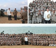 김정은, 전선 장거리포병구분대와 기념사진 촬영.."전쟁준비 태세에 만족"
