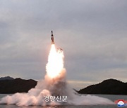 북, 저수지서 '미니 SLBM' 수중발사 발표..군은 지상발사로 오판