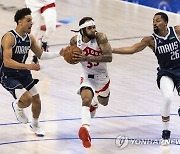 APTOPIX Raptors Mavericks Basketball