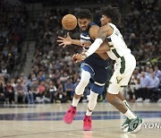 APTOPIX Bucks Timberwolves Basketball