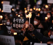 이태원 참사에 다시 켜진 촛불…與는 “조직동원‧정치선동” 비난