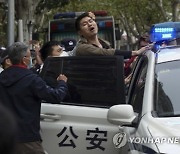 Virus Outbreak China Protest
