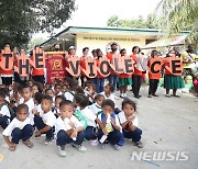 '폭력 중단' 구호 외치는 글로벌피스우먼 봉사자들