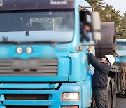 Korean industries cut production as trucker strike continues