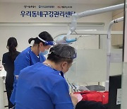 앞니 없어도 참는 사람들 위해…‘쪽방촌 치과’ 문 열었다[현장에서]