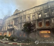 CORRECTION Cambodia Hotel Fire