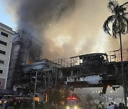 CORRECTION Cambodia Hotel Fire