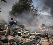 SOUTH AFRICA FIRE ILLEGAL LAND DWELLERS EVICTED