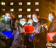노동신문 '인민 생활 편의 보장' 부각… 밤에도 일하는 일꾼들