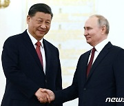 [포토] 악수하는 시진핑-푸틴