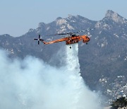 인왕산 큰불 잡혔다…“대응 1단계 하향·잔불 정리중”