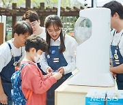 포커스미디어, 부산 최대 아파트 단지서 입주민 '봄 선물' 행사