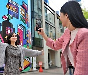 명동을 축제의 거리로 … 롯데百, 상권 부활 이끈다