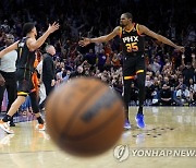 APTOPIX Nuggets Suns Basketball