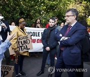 AVAAZ Action outside Credit Agricole Annual General Meeting in Paris