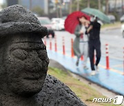 깜짝 더위 날리는 비