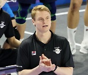 Finnish coach Tommi Tiilikainen leaves it all on the court