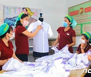 교복 생산하는 북한 피복공장…"학생들에 최우선 보장"