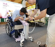 하반신 마비 환자를 위한 이동 보조기구