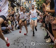 APTOPIX Spain Pride High Heels Race