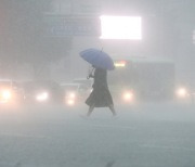 One dead, one missing as rains inundate Korea