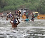 INDIA WEATHER YAMUNA WATER LEVEL RISE