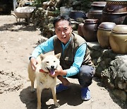 Dog makes miraculous return in village destroyed by landslide